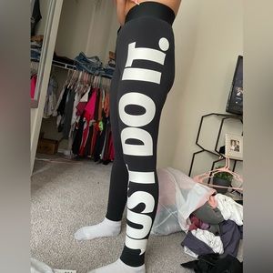 black nike leggings size small with JUST DO IT down the left leg